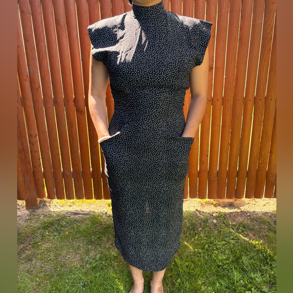 All That Jazz Mock Neck/Open Back Pencil Dress.